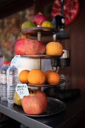 in an etagere there are the most different fruitsの写真素材