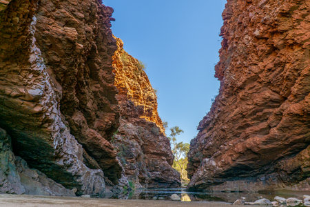 in the Australian outback there is a rugged rock formation called Simpsons Gabの写真素材