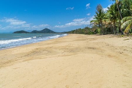 The almost deserted beach of Clifton beach near Cairns in the north of Australiaの写真素材