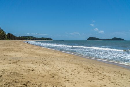 The almost deserted beach of Clifton beach near Cairns in the north of Australiaの写真素材