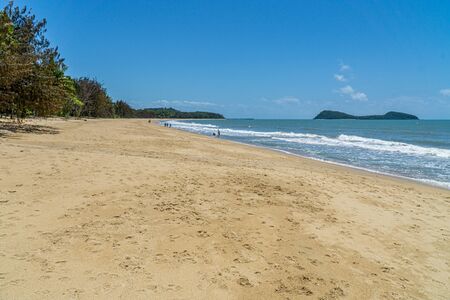 The almost deserted beach of Clifton beach near Cairns in the north of Australiaの写真素材