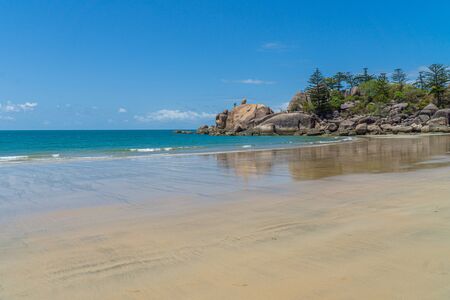 the paradisiacal beach with blue water of Magnetic Island in the northwest of Australiaの写真素材