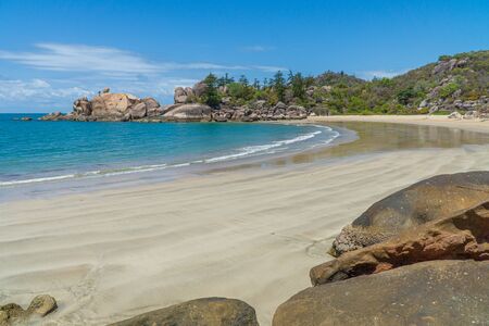 the paradisiacal beach with blue water of Magnetic Island in the northwest of Australiaの写真素材