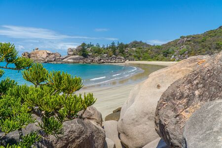 the paradisiacal beach with blue water of Magnetic Island in the northwest of Australiaの写真素材