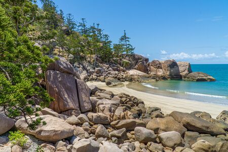 the paradisiacal beach with blue water of Magnetic Island in the northwest of Australiaの写真素材