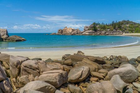 the paradisiacal beach with blue water of Magnetic Island in the northwest of Australiaの写真素材