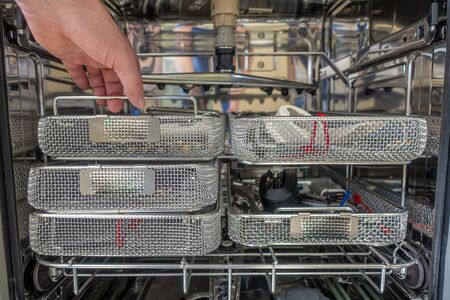 Used instruments were cleaned and disinfected in an RDG washing machineの写真素材