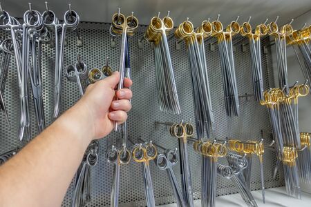 in a cabinet in the operating theatre there are various surgical instruments as a reserve for refillingの写真素材