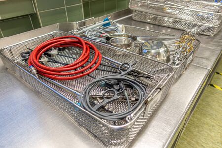 a tray for surgical instruments contains various assorted instruments for performing an operationの写真素材