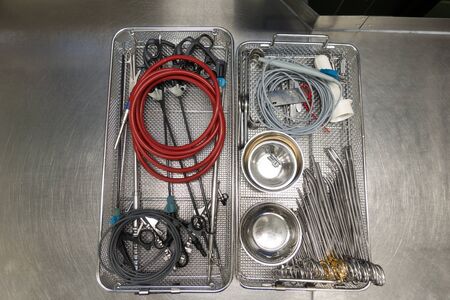 a tray for surgical instruments contains various assorted instruments for performing an operationの写真素材