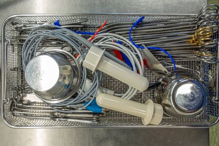 a tray for surgical instruments contains various assorted instruments for performing an operationの写真素材