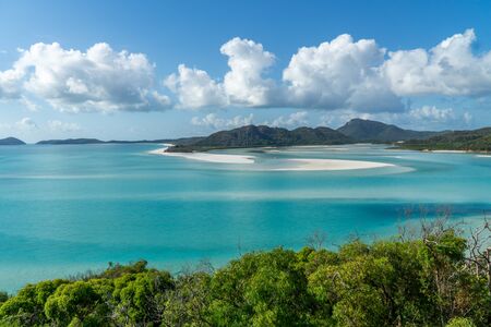 the white beach of the Whitsunday Islands in Australia, which consists of 99 percent quartz sand, and the azure blue seaの素材 [FY310135081257]