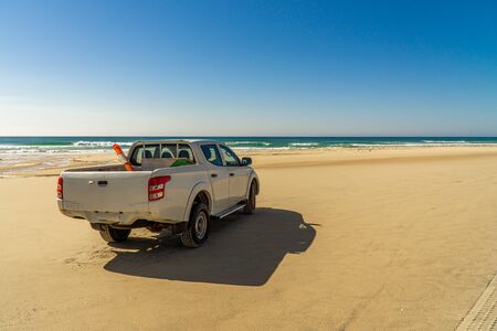there's a white pickup truck on Fraser Island beach.の写真素材