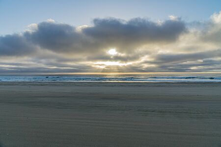 on the beach of Fraser Island you can see a beautiful sunrise like in paradiseの写真素材