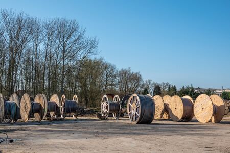 there are many large cable drums in one placeの写真素材