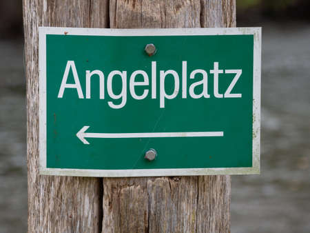 on a green sign is the german word Angelplatz