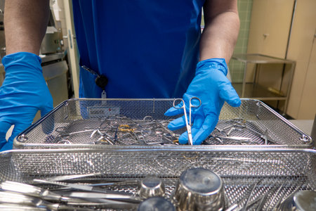 in a sterilization department in an operating room, instruments are sorted and cleaned