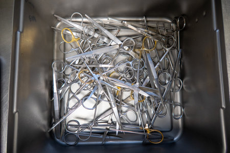in the sterilization department in an operating room, instruments are sorted and cleanedのeditorial素材