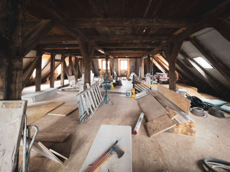 an old half-timbered house is extensively restoredの写真素材