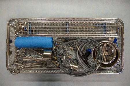 packed instrument tray for performing a urological resection is open in the operating room