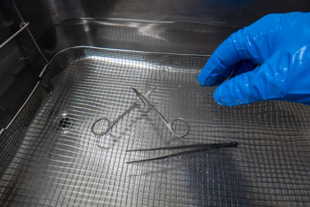 a dirty instrument is placed in an ultrasonic basin