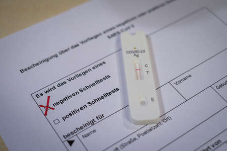 a negative corona covid-19 rapid test is on a test form
