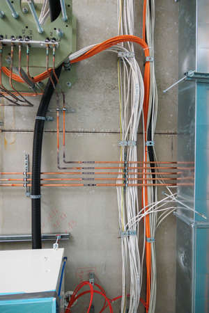 Cables and pipes run along the ceiling of a new operating theater building