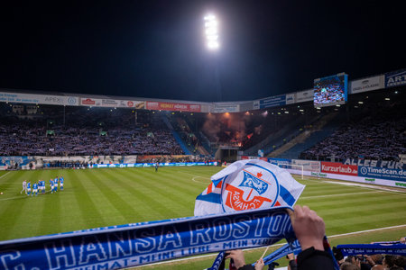 The football match of Hansa Rostock against St. Pauli in Rostock football stadiumのeditorial素材