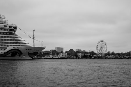 The cruise ship AIDA diva is moored in Rostock harborのeditorial素材