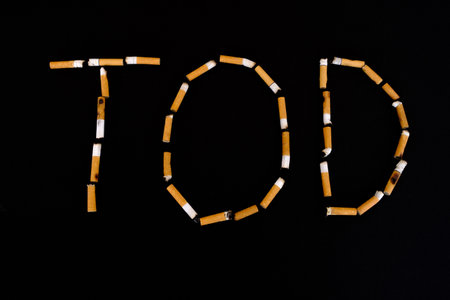 with cigarette butts was recreated the German word deathの写真素材