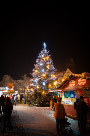 the small Christmas market in Wismar in the eveningの写真素材