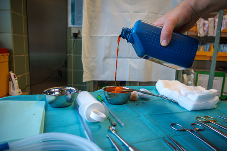 a colored disinfectant is poured into a bowlの写真素材