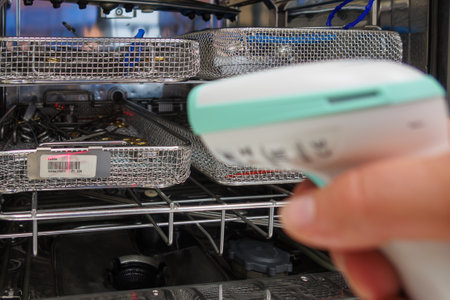 an instrument sieve is scanned in a sterilization departmentの写真素材