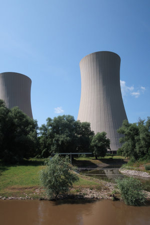 Next to a river is a nuclear power plantの写真素材