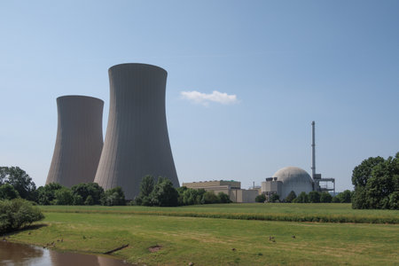 Next to a river is a nuclear power plantの写真素材