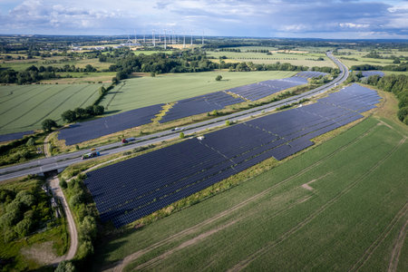 A large open-space photovoltaic system for generating electricity is located directly next to the...