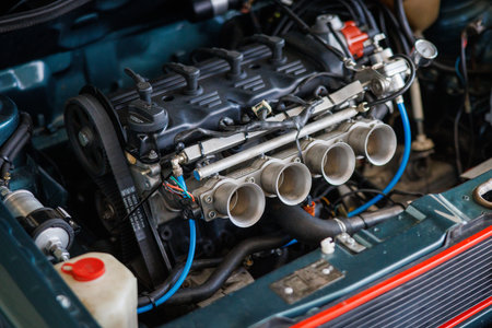 The engine compartment of a VW Golf contains a tuned engine
