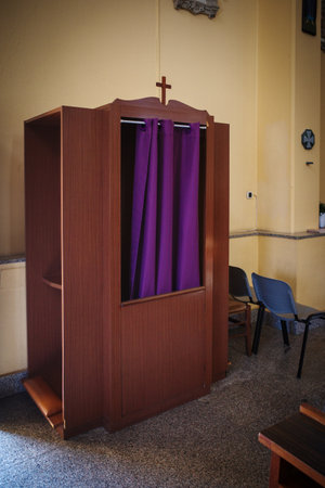 The confessional of a catholic churchの写真素材