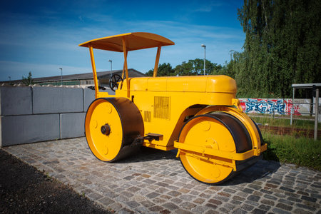 An old yellow leveling rollerの写真素材