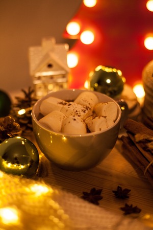 Christmas lights. Hot cocoa, marshmelow, vanilla, cinnamon. Christmas decorations. Festive mood. Cozy.の写真素材