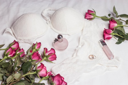 Valentine's Day. Celebratory background. Flowers, women's lace underwear, cosmetics, jewelry, perfume Gift Wedding Love springの写真素材