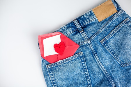 Jeans on a white background. Pocket. A heart. Valentines Day. Love. Holidays.の写真素材