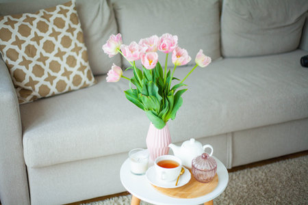 Bouquet of beautiful tulips in a vase in a home interior.の写真素材
