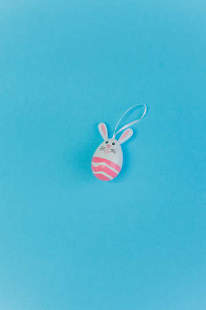 Easter. Easter decor on a blue background. Quarantine. Coronavirus. Spring.の写真素材