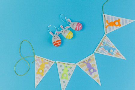 Easter. Easter decor on a blue background. Quarantine. Coronavirus. Spring.の写真素材