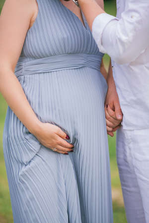 A young married couple is waiting for a baby.の写真素材