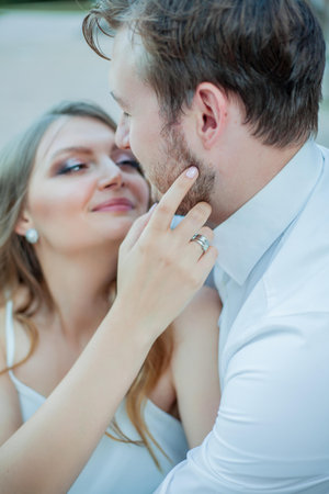 Beautiful young couple in love near the old palace. Wedding.の写真素材