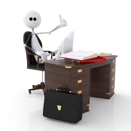 The white little man in the office at a table.の写真素材