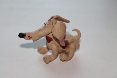 A handmade ceramic figurine of a dogの写真素材