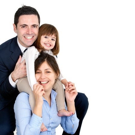 Portrait of young couple having fun with their daughter. Isolated on white background.の写真素材